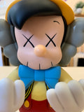 KAWS (B.1974) PINOCCHIO & JIMINY CRICKET PINOCCHIO estampillé '©Disney KAWS.. MEDICOM TOY 2010 CHINA