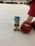 KAWS (B.1974) PINOCCHIO & JIMINY CRICKET PINOCCHIO estampillé '©Disney KAWS.. MEDICOM TOY 2010 CHINA